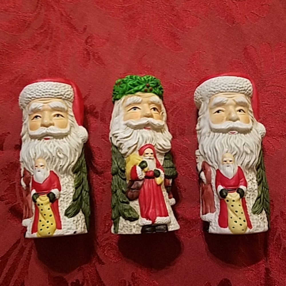 Three Santa Christmas candle holders